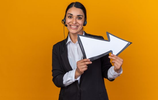 enquiry smiling young bautiful girl wearing black blazer with headset holding direction mark isolated on orange background SSUCv3H4sIAAAAAAAACpyRy47DIAxF9yPNP0SsGylpHtP0V6pZOMZtUClUQDoaVf334REq1rPDx/a1r3l+flQVm8EKZMfqGSIfCylX6ww4oZXHzW7jhhQnU5KH6camBMSF00aALOEMDhcFN/JQrVIG/IpJZh241ZIN0zeE4OjiNRJ8S6QVTymuciImfYdPMbYrmF3nyDJK4v/qTI/v7AYupPA3LlwYMSQJkpFTKmXXH0fmVlqDlQtduHpoBBkKukLpbgQKdSnatFvi2XMb6lU5E1Z4b86k1neYZTjx2WtS5gtY68t55sUg9J+sb8UcpV00sKky7n8ihG23H7tuGtqhP+y/hmaatoL0e4vwOnGdLORjvApeWhdhAzZMCN1EVB9wbOp+Hvt6whbq8dwTDYcz4MD94V9/AAAA//8DAL+P9qOYAgAA